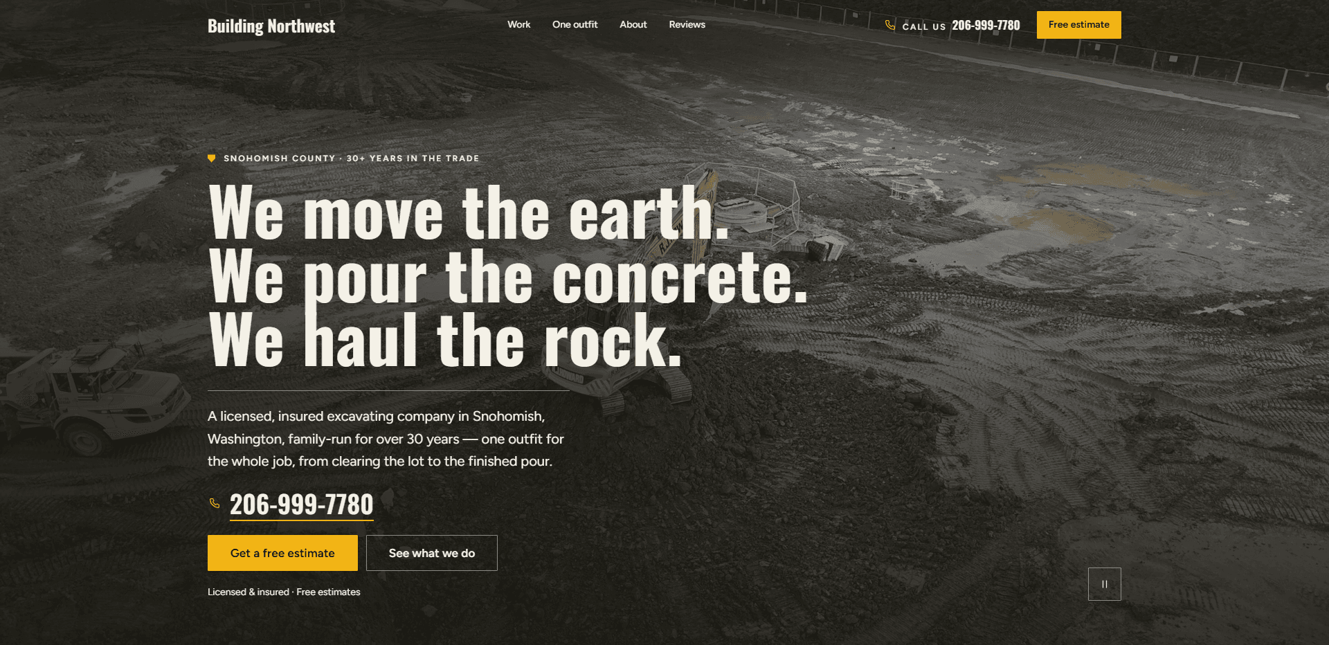 Homepage of Building Northwest: a dark wash over an aerial video still of a muddy graded lot crossed with track marks, an orange excavator and a yellow articulated dump truck working below a fence line, under a top bar carrying the condensed 'Building Northwest' wordmark, navigation reading Work, One outfit, About, and Reviews, a 'Call us' phone number, and a yellow 'Free estimate' button, above a shield mark and the kicker 'Snohomish County - 30+ years in the trade', the oversized condensed headline 'We move the earth. We pour the concrete. We haul the rock.', a paragraph about a licensed, insured, family-run excavating company in Snohomish, Washington handling the whole job from clearing the lot to the finished pour, the phone number in large type, a yellow 'Get a free estimate' button beside an outlined 'See what we do' button, the line 'Licensed & insured - Free estimates', and a pause control for the background video in the corner.