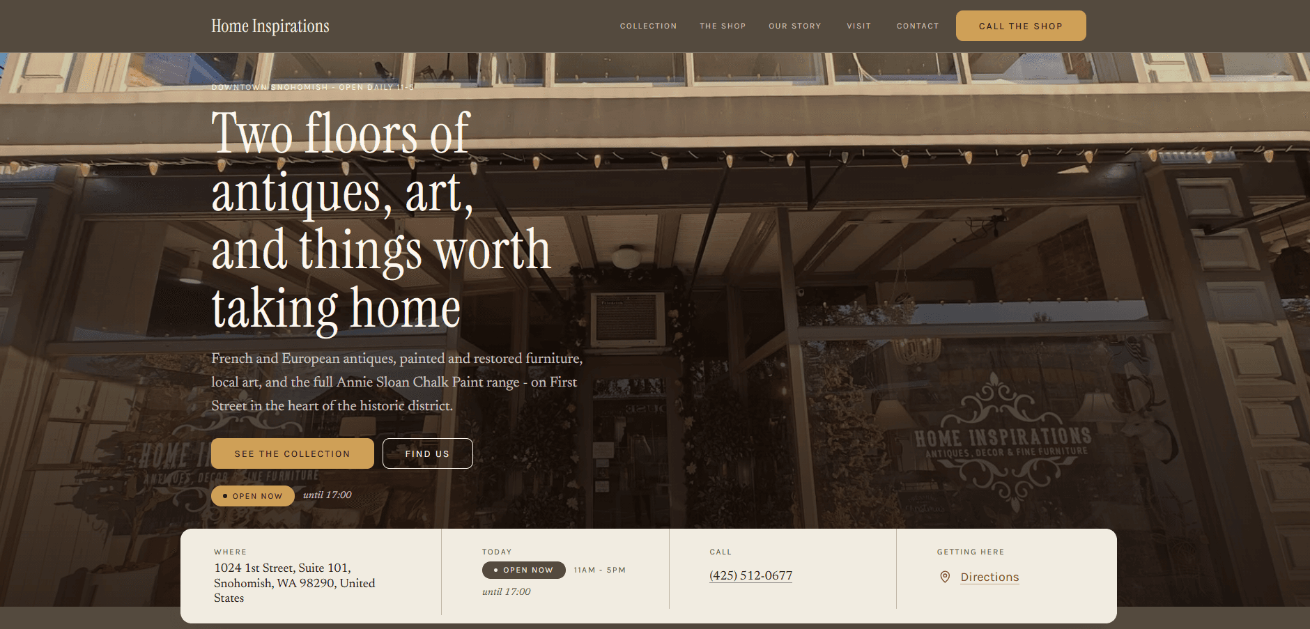 Homepage of Home Inspirations: a warm sepia page over a photograph of the shop's lit storefront windows, with the serif headline 'Two floors of antiques, art, and things worth taking home', buttons to see the collection and find the shop, and a bar listing the Snohomish address, hours, and phone number.