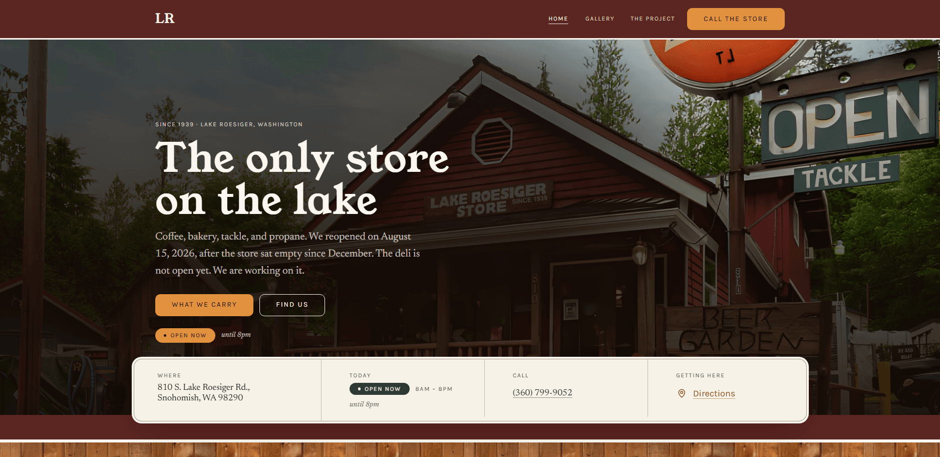 Homepage of Lake Roesiger Store: a deep brick-red top bar with an 'LR' monogram, navigation reading Home, Gallery, and The Project, and an orange 'Call the store' button, above a darkened photograph of the red wooden store under tall firs with its 'Open' and 'Tackle' signs, carrying the kicker 'Since 1939 - Lake Roesiger, Washington', the serif headline 'The only store on the lake', a paragraph about coffee, bakery, tackle, and propane, 'What we carry' and 'Find us' actions, and an open-now badge, with a cream information bar across the bottom listing the address, today's hours, the phone number, and a directions link.
